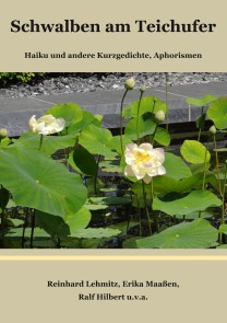 Schwalben am Teichufer